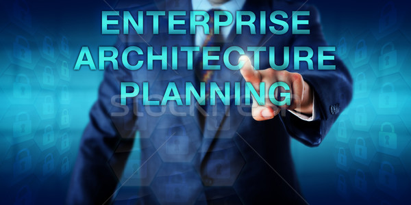 Manager Touching ENTERPRISE ARCHITECTURE PLANNING Stock photo © leowolfert