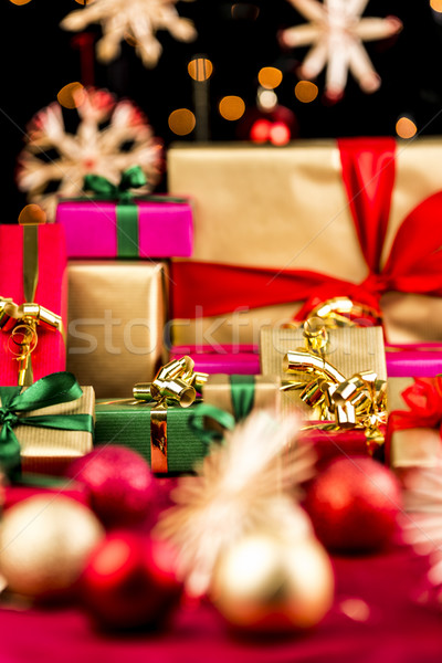 Unicolored Xmas Presents Between Baubles and Stars Stock photo © leowolfert