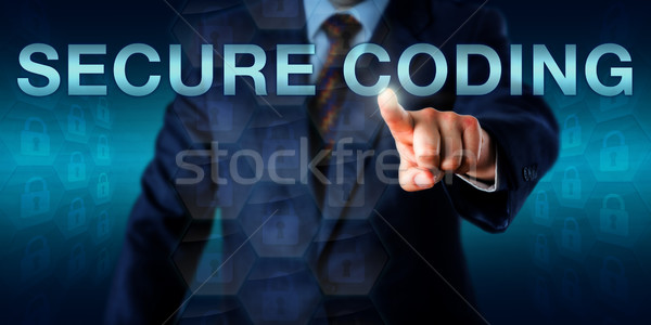 Security Professional Touching SECURE CODING Stock photo © leowolfert