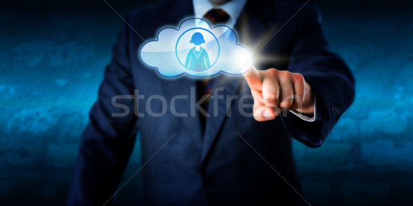 Manager Connecting With Female Peer Via The Cloud Stock photo © leowolfert