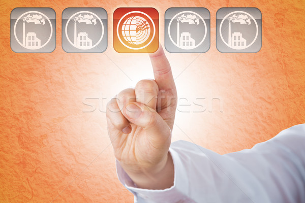 Stock photo: Index Finger Pushing Geothermal Energy Button