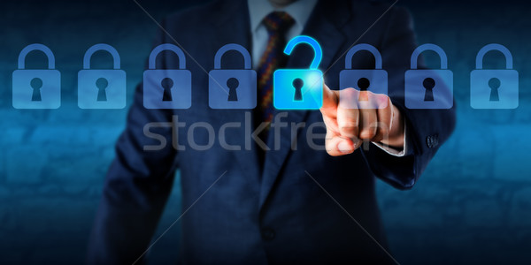 Manager Unlocking A Virtual Lock In A Lineup Stock photo © leowolfert