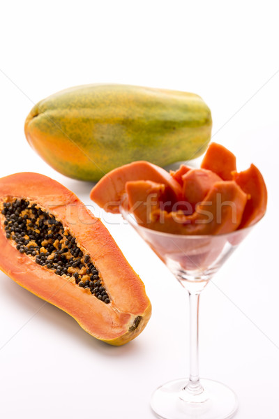 Papaya - a globose, green and yellow fruit
 Stock photo © leowolfert