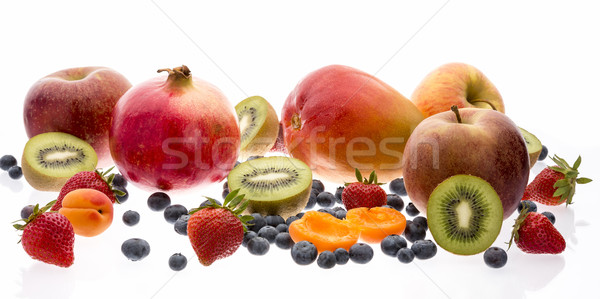 Keverék trópusi gyümölcs fehér közelkép gyümölcs mix Stock fotó © leowolfert