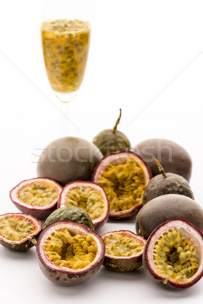 Passion Fruit Flesh In Its Rind And In A Glass Stock photo © leowolfert