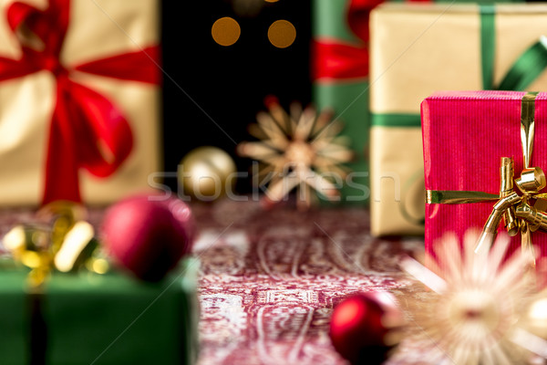 Christmas Gifts Placed on a Festive Cloth Stock photo © leowolfert