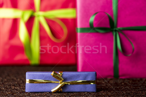 Three presents, bows and ribbons
 Stock photo © leowolfert