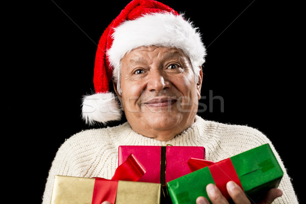 Onzeker oude gentleman drie geschenken Stockfoto © leowolfert