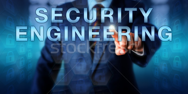 Software Engineer Touching SECURITY ENGINEERING Stock photo © leowolfert