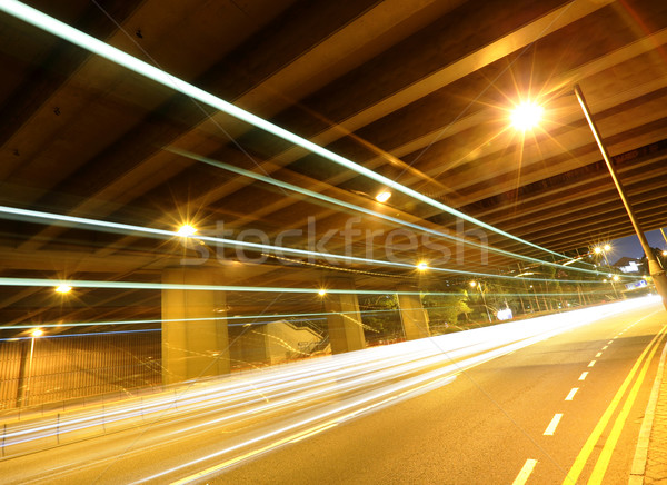 Tráfego noite da cidade negócio luz ponte azul Foto stock © leungchopan