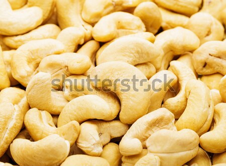 Fresh cashew nuts cloes up Stock photo © leungchopan