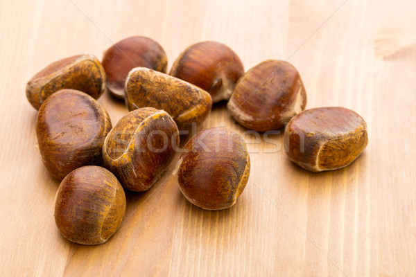 Ippocastano tavola legno sfondo shell fresche Foto d'archivio © leungchopan