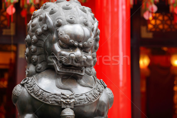 Bronze lion in chinese temple Stock photo © leungchopan