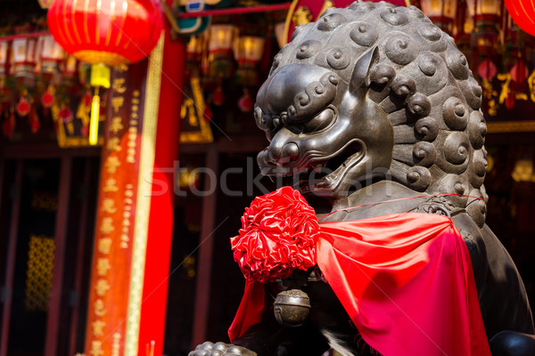 Chinese ancient buildings in front of the stone lions  Stock photo © leungchopan