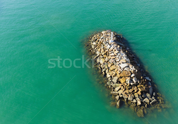 Wave breaker stone Stock photo © leungchopan