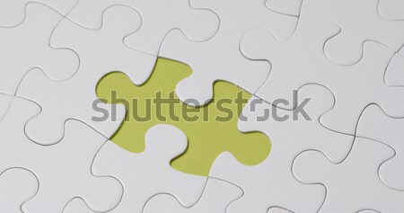 Puzzle with missing piece in green color Stock photo © leungchopan