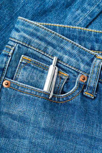 Blue jean pocket with pen Stock photo © leungchopan