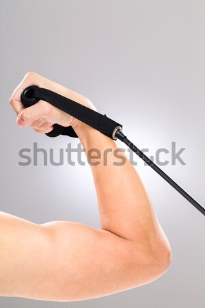 Stretching arm by rubber band Stock photo © leungchopan