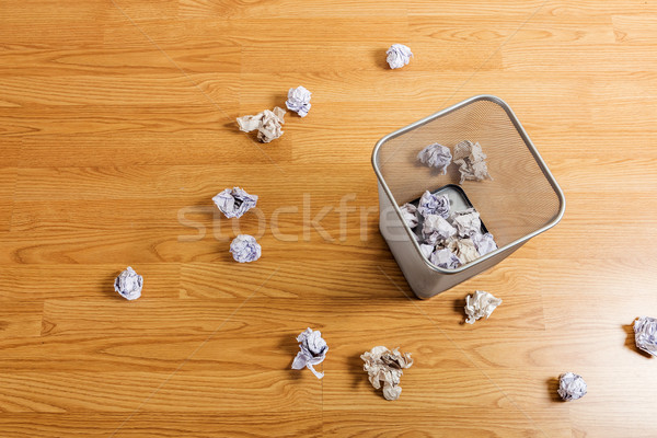 Metal basket and paper ball Stock photo © leungchopan