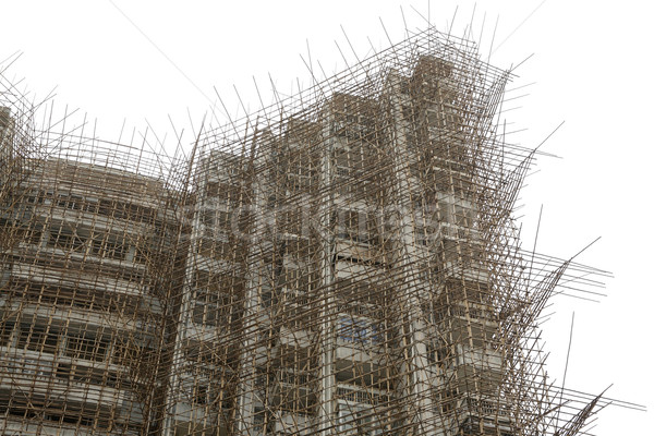 Bambusz állványzat építkezés égbolt ipari építészet Stock fotó © leungchopan