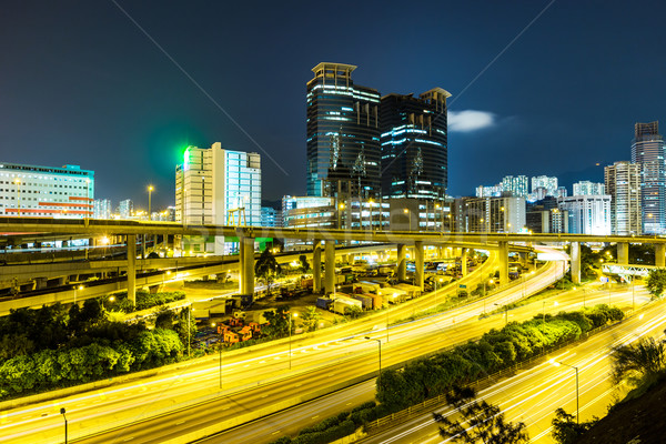 Busy traffic on highway at night Stock photo © leungchopan