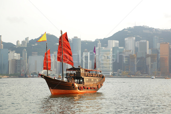 Hong Kong harbour with tourist junk Stock photo © leungchopan