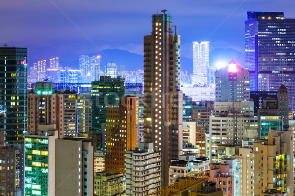 Foto stock: Hong · Kong · lleno · de · gente · edificios · noche · negocios · edificio