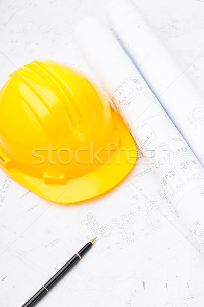 Construction drawing and safety helmet Stock photo © leungchopan
