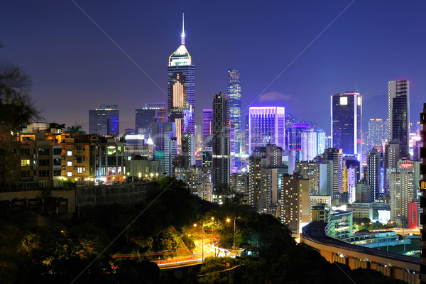 Hongkong überfüllt Gebäude Nacht Business Himmel Stock foto © leungchopan