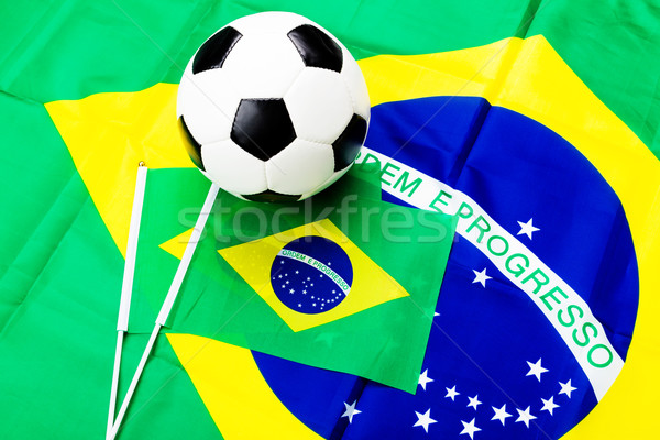 Brazilian flag and soccer ball Stock photo © leungchopan