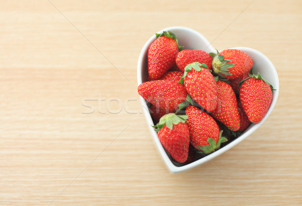 Strawberry with love Stock photo © leungchopan