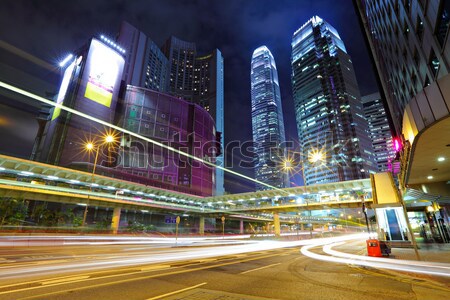 Traffic through the city at night Stock photo © leungchopan