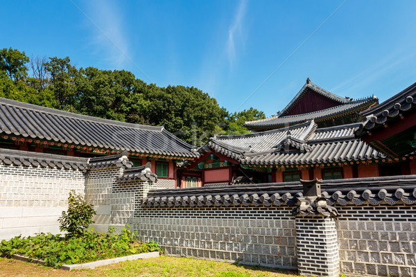 Traditional korean architecture with castle wall Stock photo © leungchopan