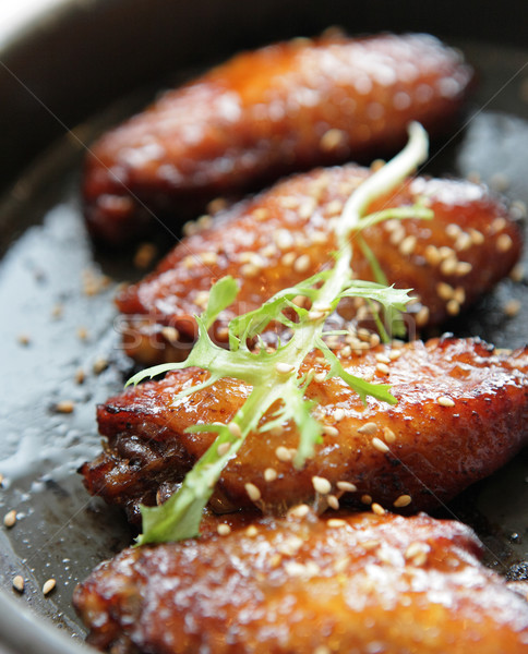 Pollo alas manos fiesta fuego Foto stock © leungchopan