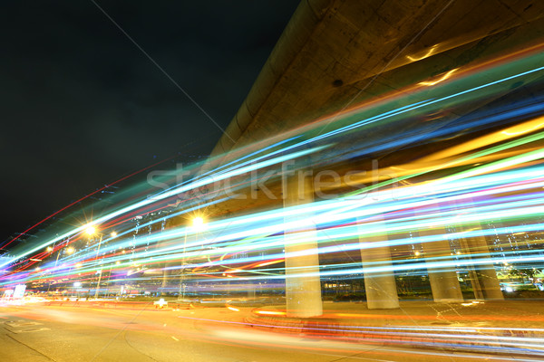 Traffic trail in city at night Stock photo © leungchopan