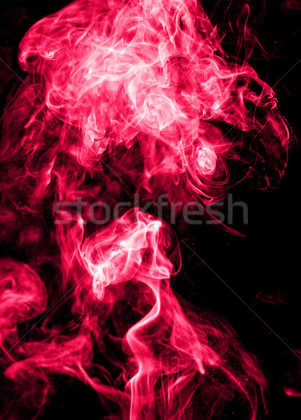 Red smoke on a black background Stock photo © leungchopan
