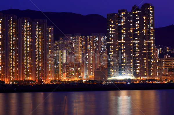 Apartment block at night in Hong Kong  Stock photo © leungchopan