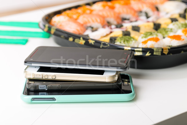 Sushi iş telefon ağ zaman Stok fotoğraf © leungchopan