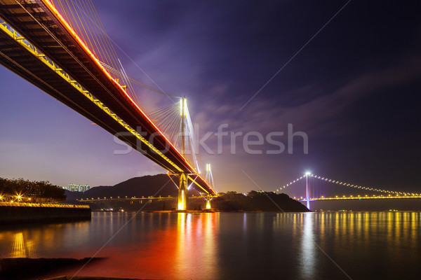 Asma köprü Hong Kong gece su manzara deniz Stok fotoğraf © leungchopan