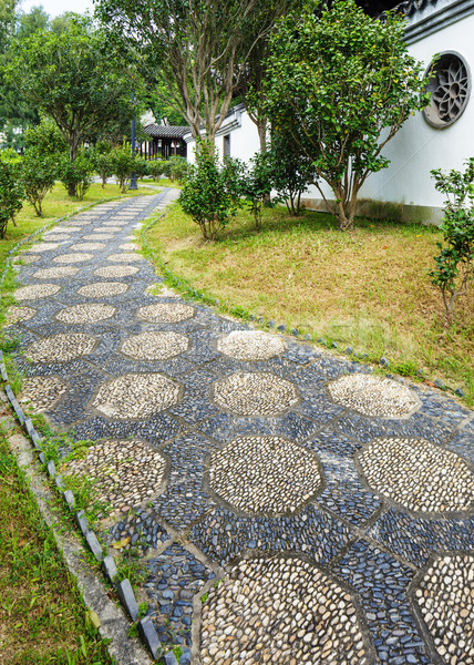 Pebble stone path in chinese garden Stock photo © leungchopan