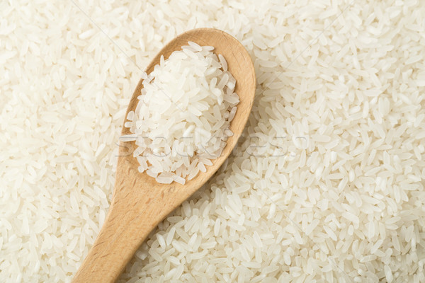 White rice on teaspoon Stock photo © leungchopan