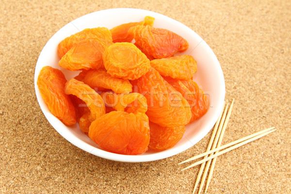 Dried apricots with toothpick Stock photo © leungchopan