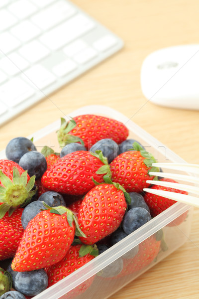 Healthy lunch on the working desk Stock photo © leungchopan