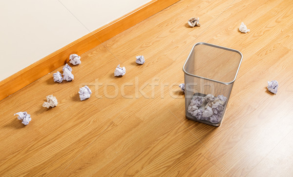 Trash bin and paper ball Stock photo © leungchopan