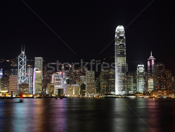 éjszakai jelenet Hongkong város éjszaka modern szín Stock fotó © leungchopan