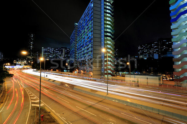 Forgalom belváros éjszaka autó épület absztrakt Stock fotó © leungchopan