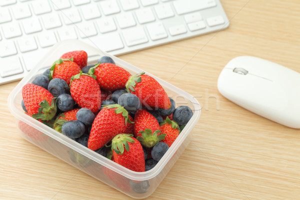 Healthy lunch box in working desk Stock photo © leungchopan