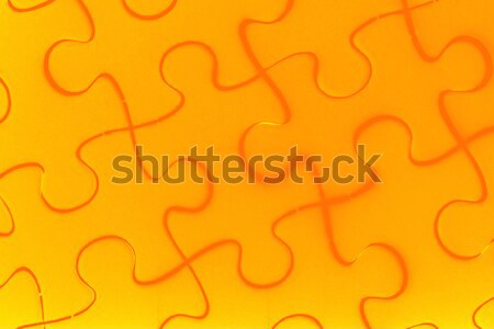 Puzzle in orange Stock photo © leungchopan