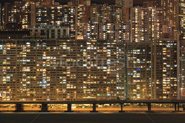 Apartment block at night, Hong Kong Stock photo © leungchopan