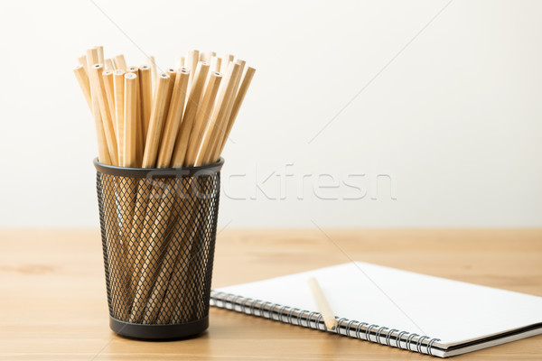 Pencil and notebook  Stock photo © leungchopan
